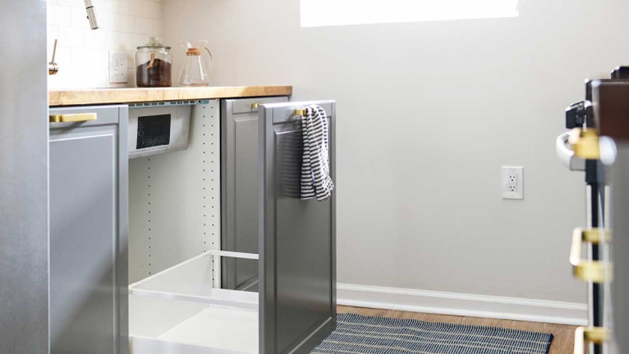 How to install a pull-out bin in a kitchen cupboard