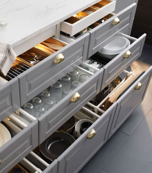 Frameless SEKTION cabinet drawers show their storage capability