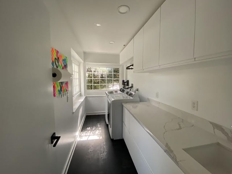 Clean White IKEA laundry room