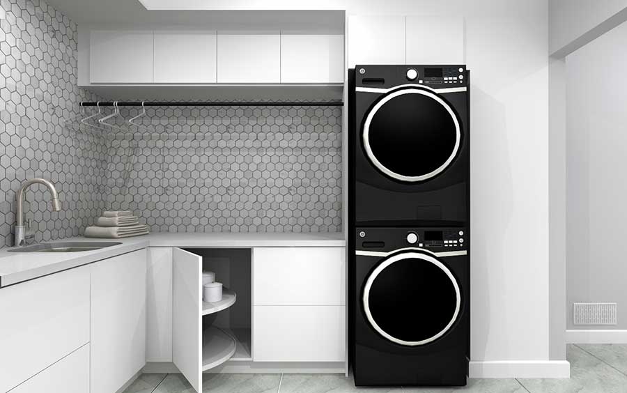 White laundry room with black appliances