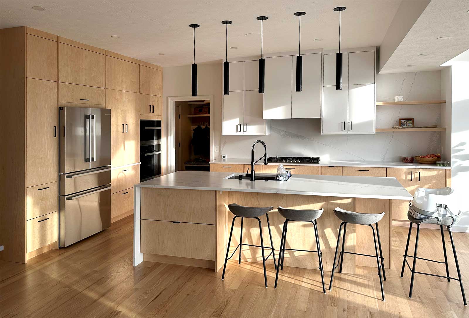custom ikea cabinets in wood-toned modern kitchen design