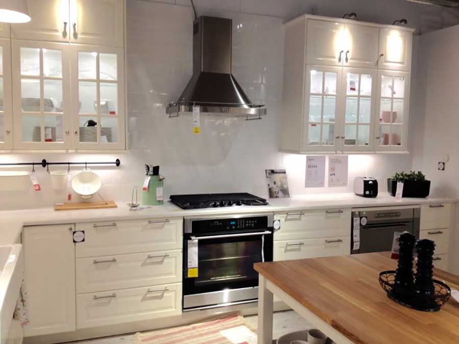 Small kitchen with white cabinets