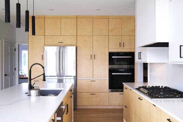 Custom IKEA Cabinets in Wood-Toned Modern Kitchen Design