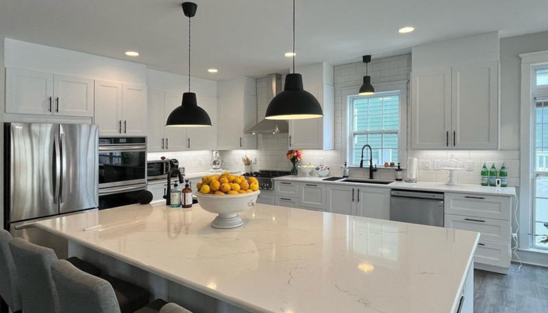 An Avid Baker Designs A Huge Island In His L Shaped White Kitchen   1 An Avid Baker Designs A Huge Island In His L Shaped White Kitchen 800x457 